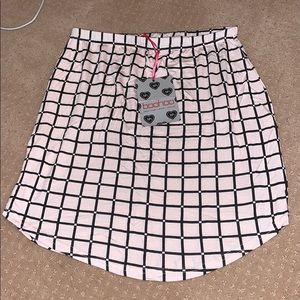 Light pink and black checker mini skirt
